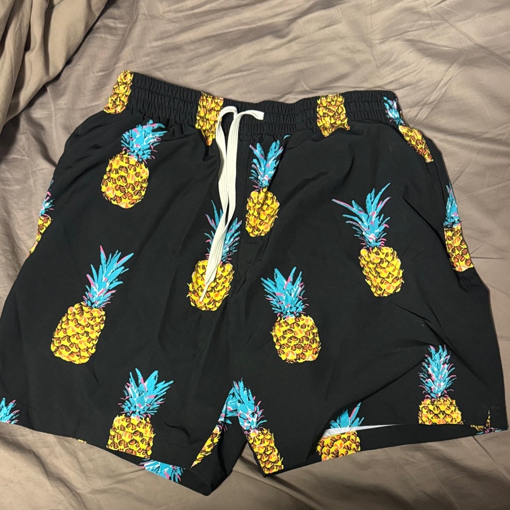 chubbies 7” Black Swim Trunks with Yellow & Teal Pineapple Print